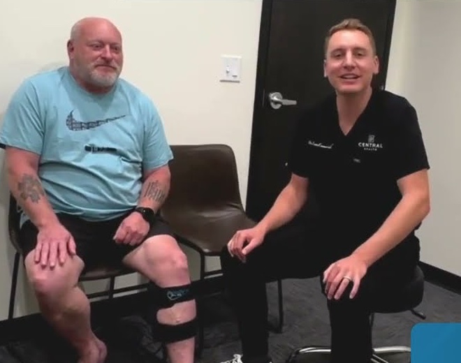 Dr. Emmerich with a knee pain patient